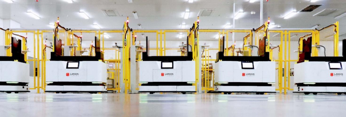 Robot tải/giải phóng máy tráng phủ