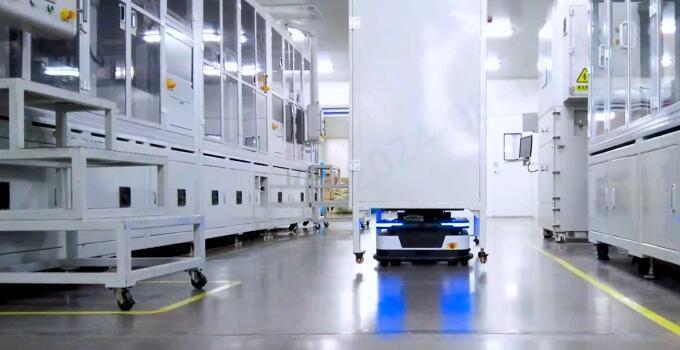 Robot tải/giải phóng máy tráng phủ
